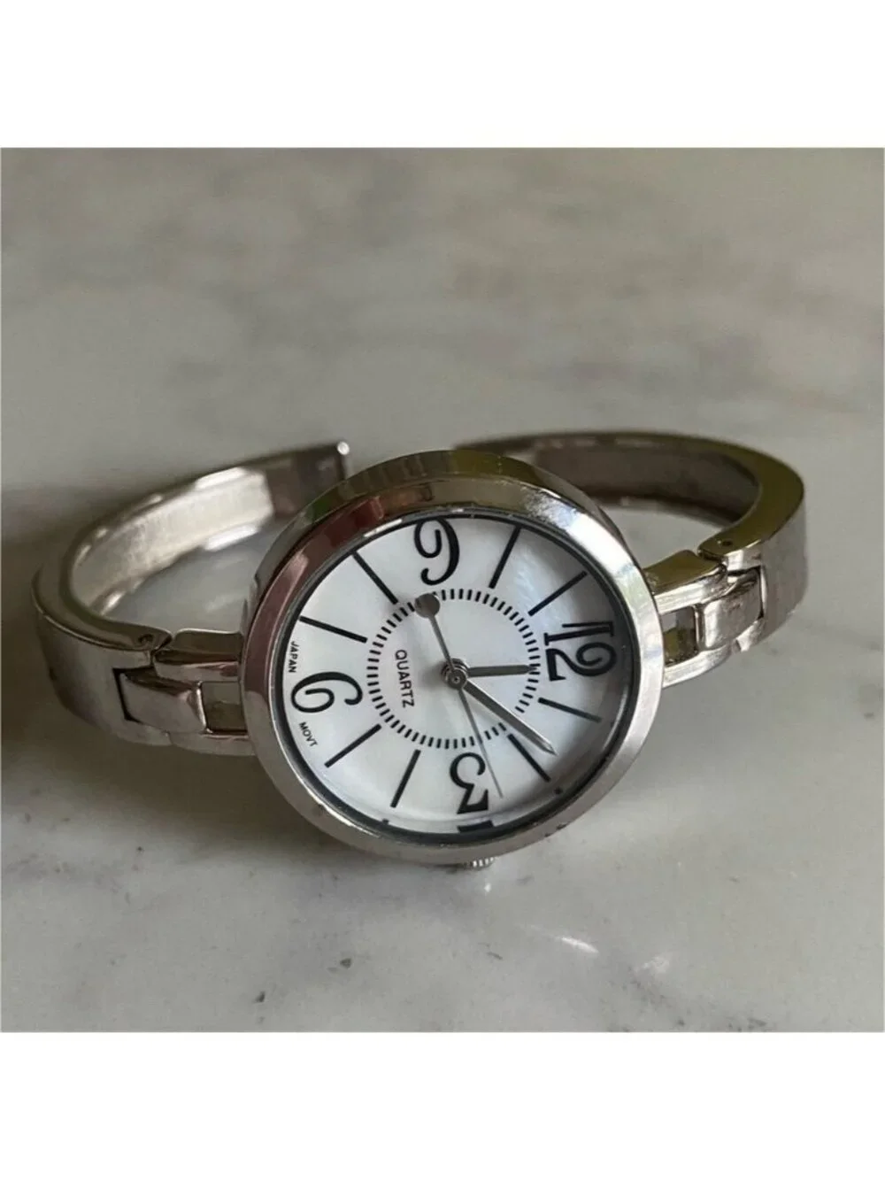 Avon silver tone